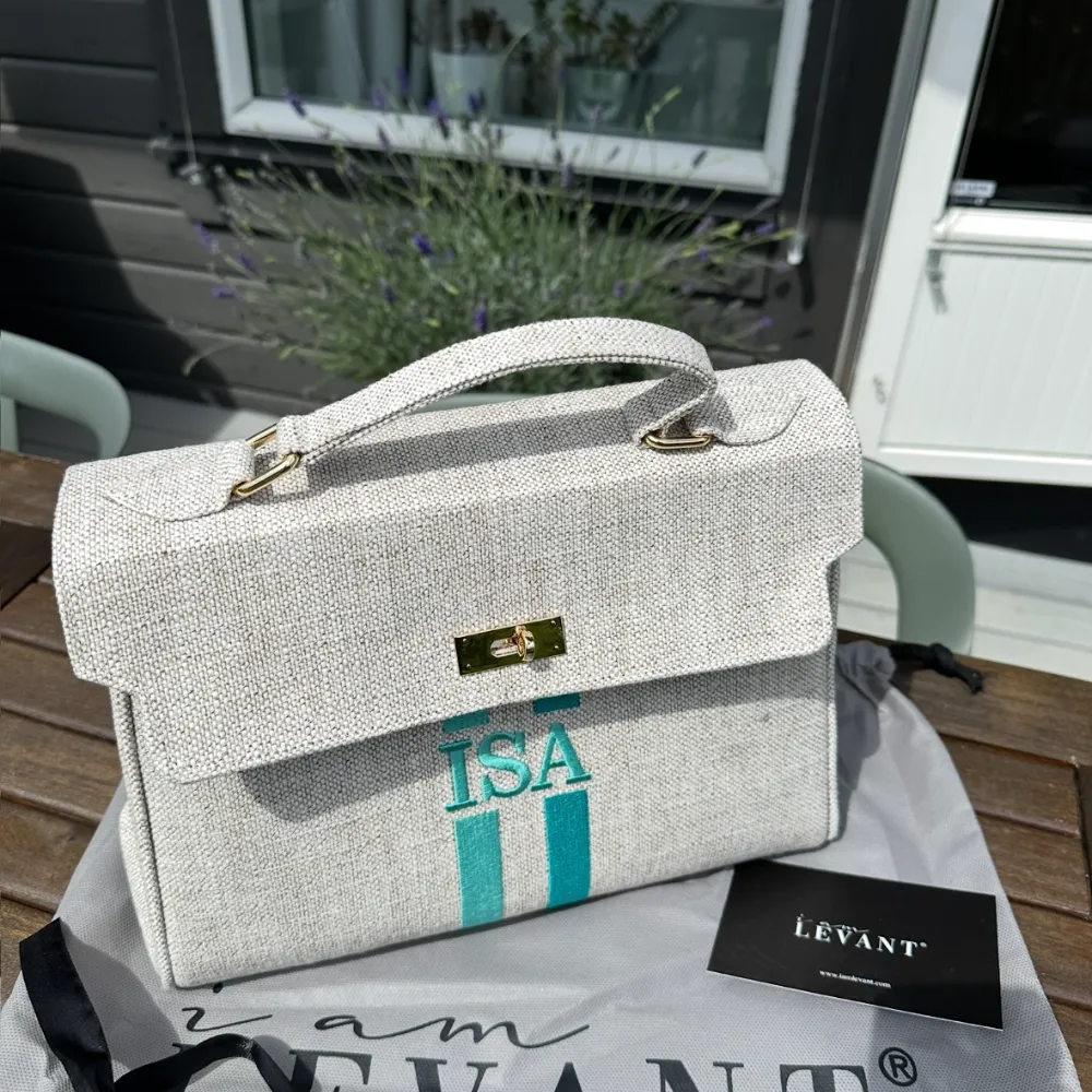 Customer with I Am Levant bag